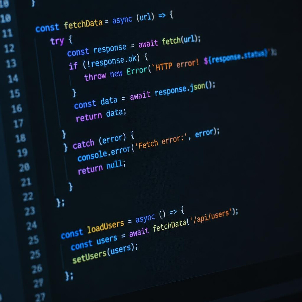 Lines of programming code on a dark monitor