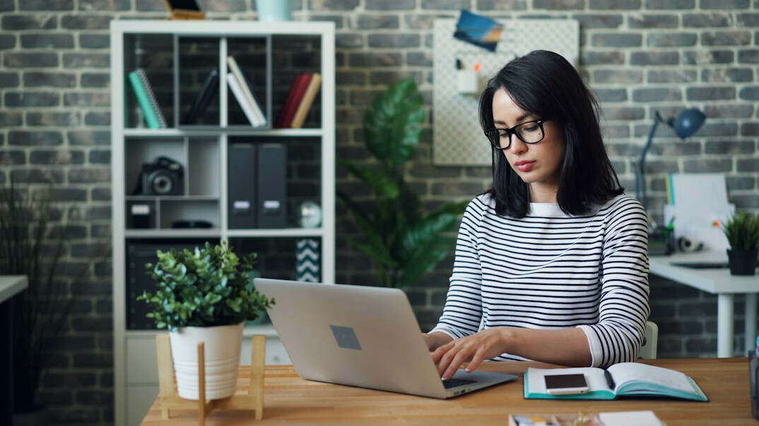 woman studying at desk