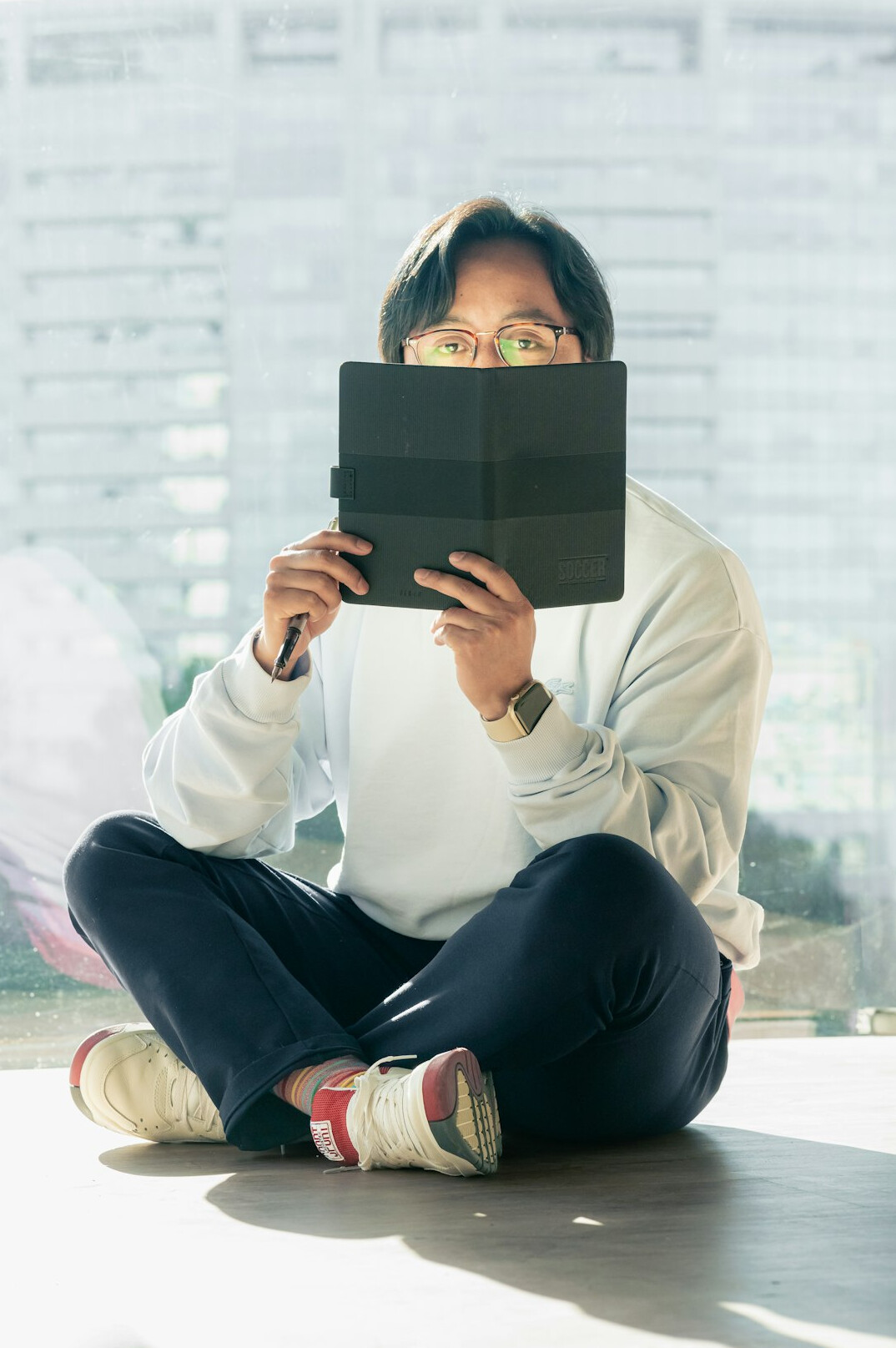 person studying with tablet