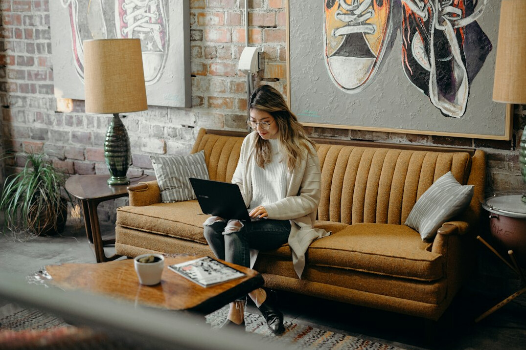 person using laptop at home