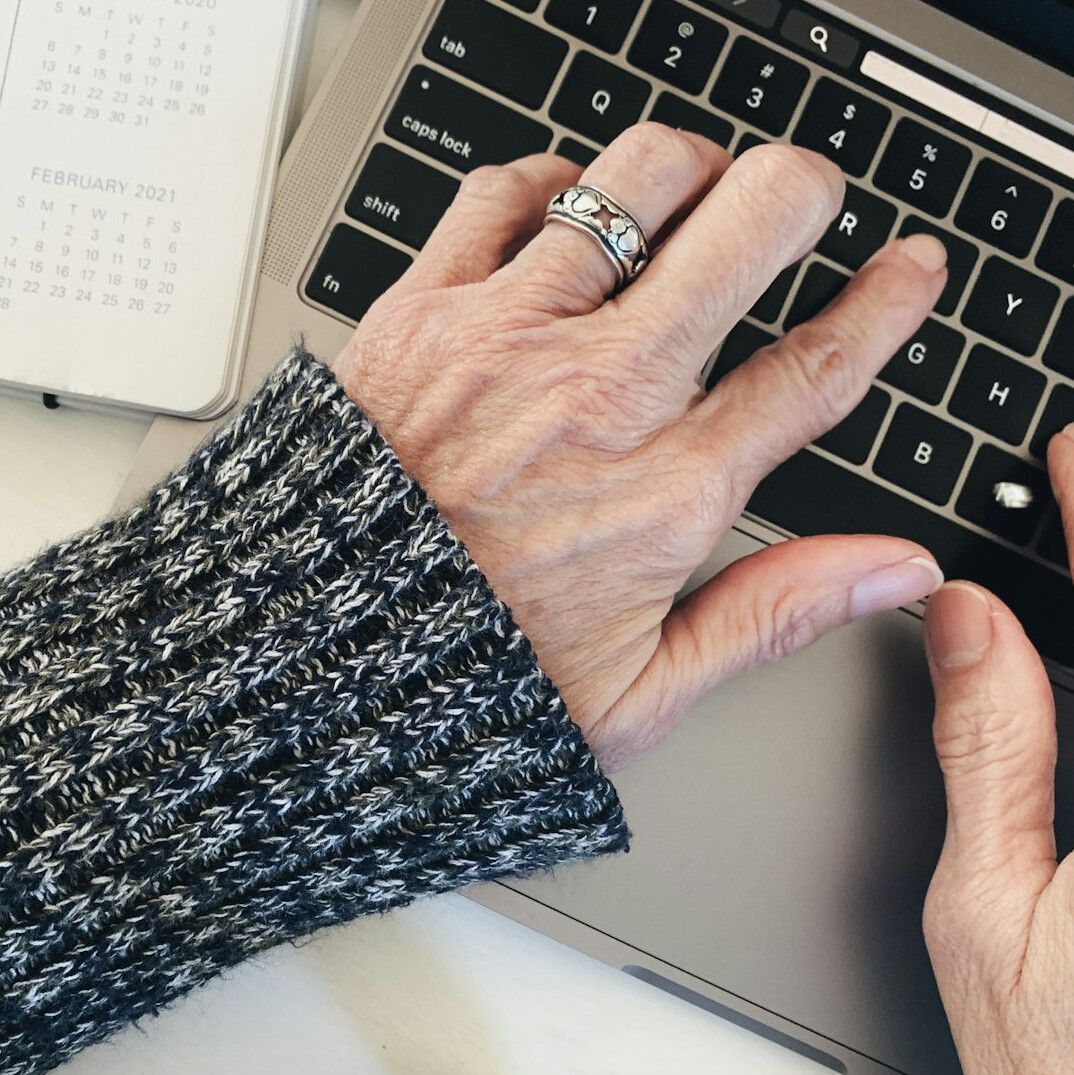 elderly person learning computer